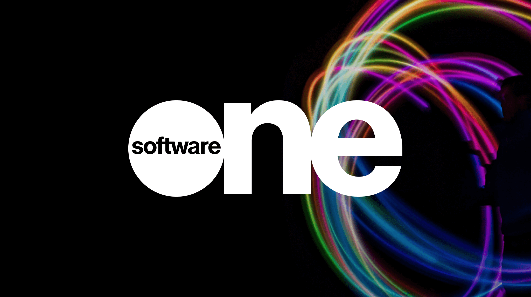 Logo of SoftwareONE on a black background, featuring vibrant, colorful light trails swirling around the text, representing innovation and technology solutions.